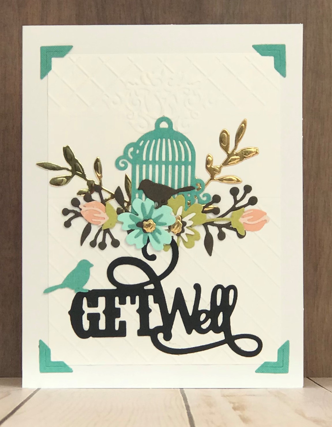 Make a get well card with bird cage and flowers.